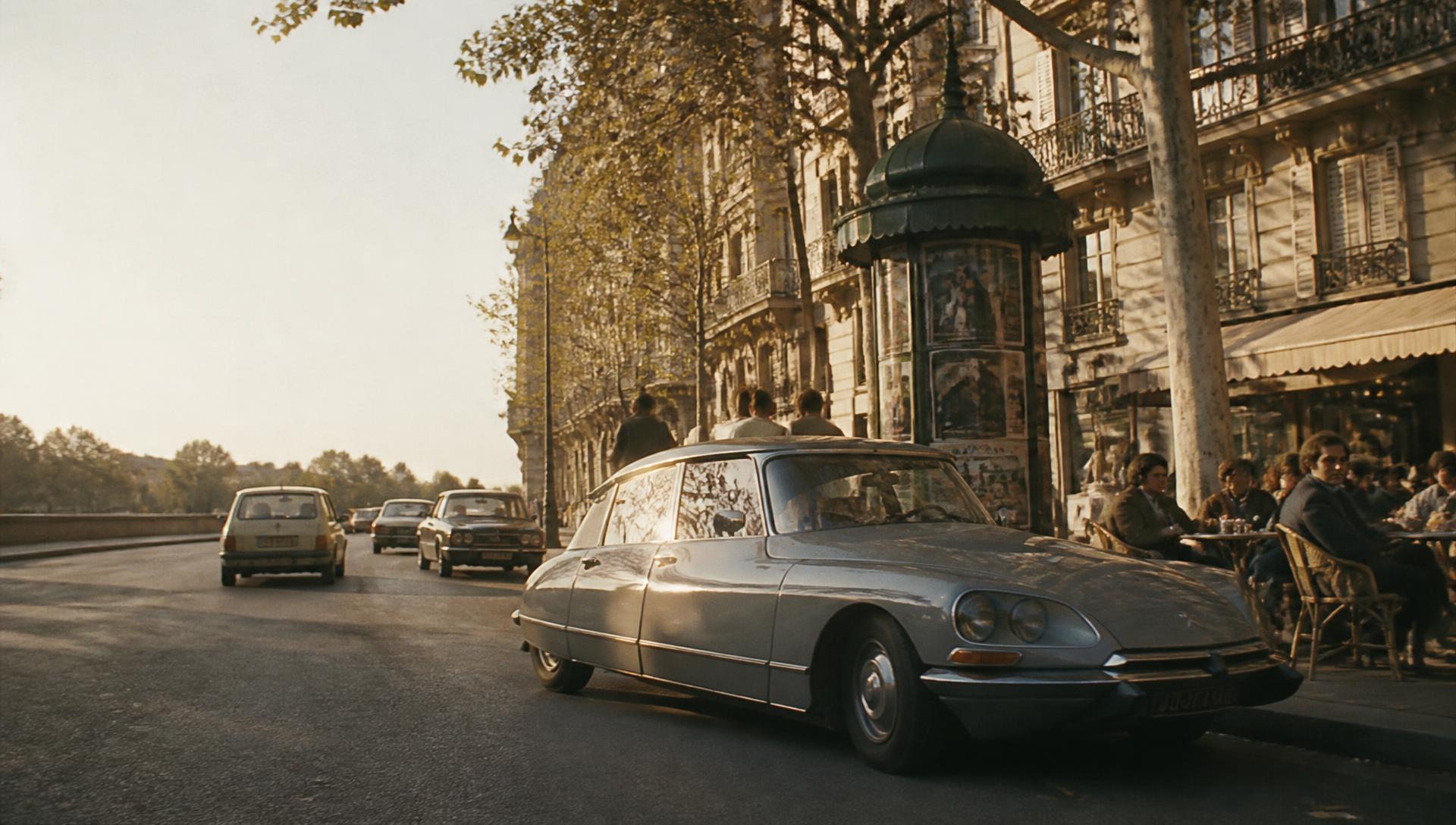 A Citroën DS on a Paris boulevard in golden afternoon light, 1974